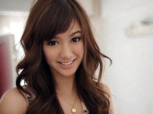 Dark-chocolate-brown-hair-color-for-Asian-girl-with-long-wavy-hair